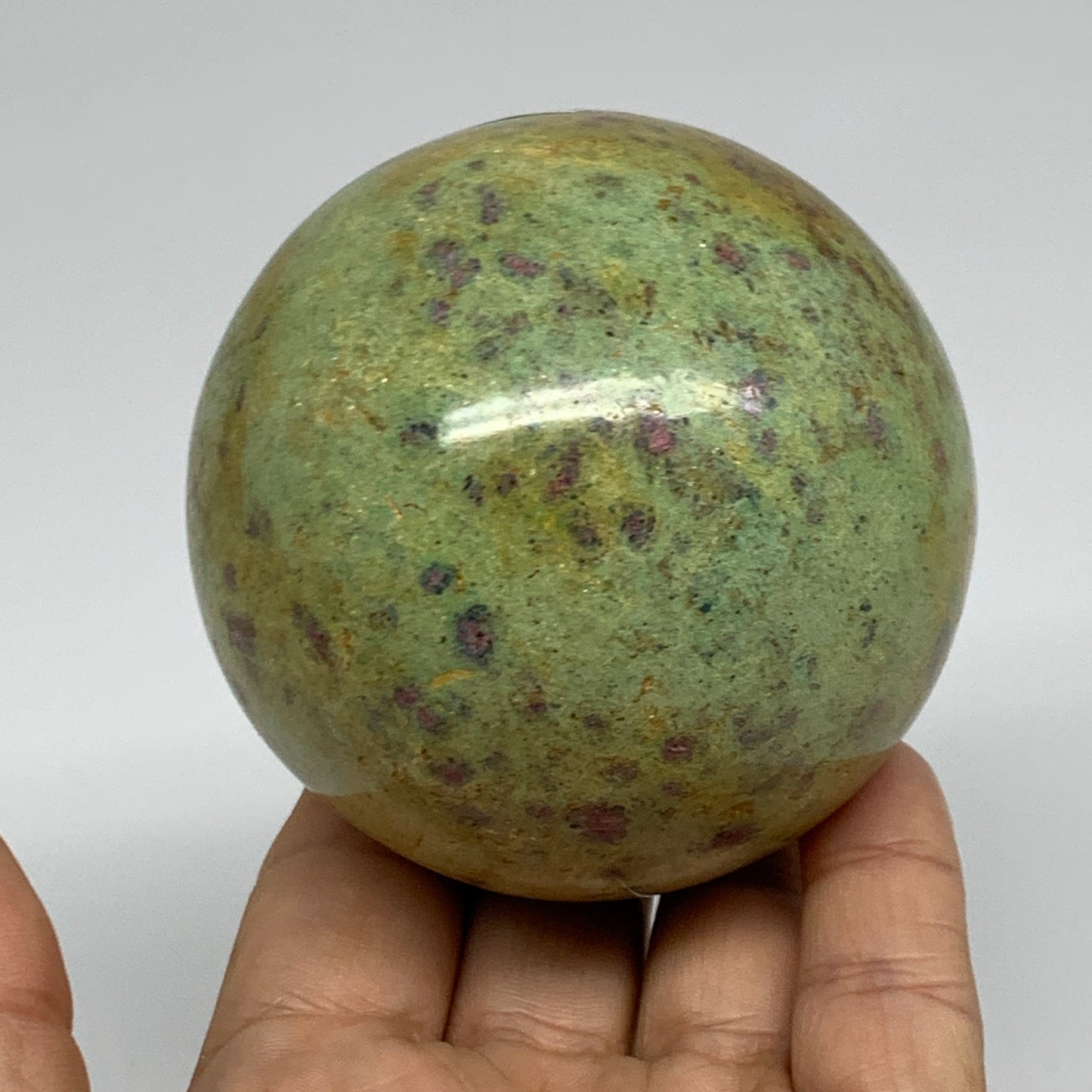 1.26 lbs, 2.8"(72mm), Zoisite with Ruby Sphere Sphere Ball Crystal, B25208