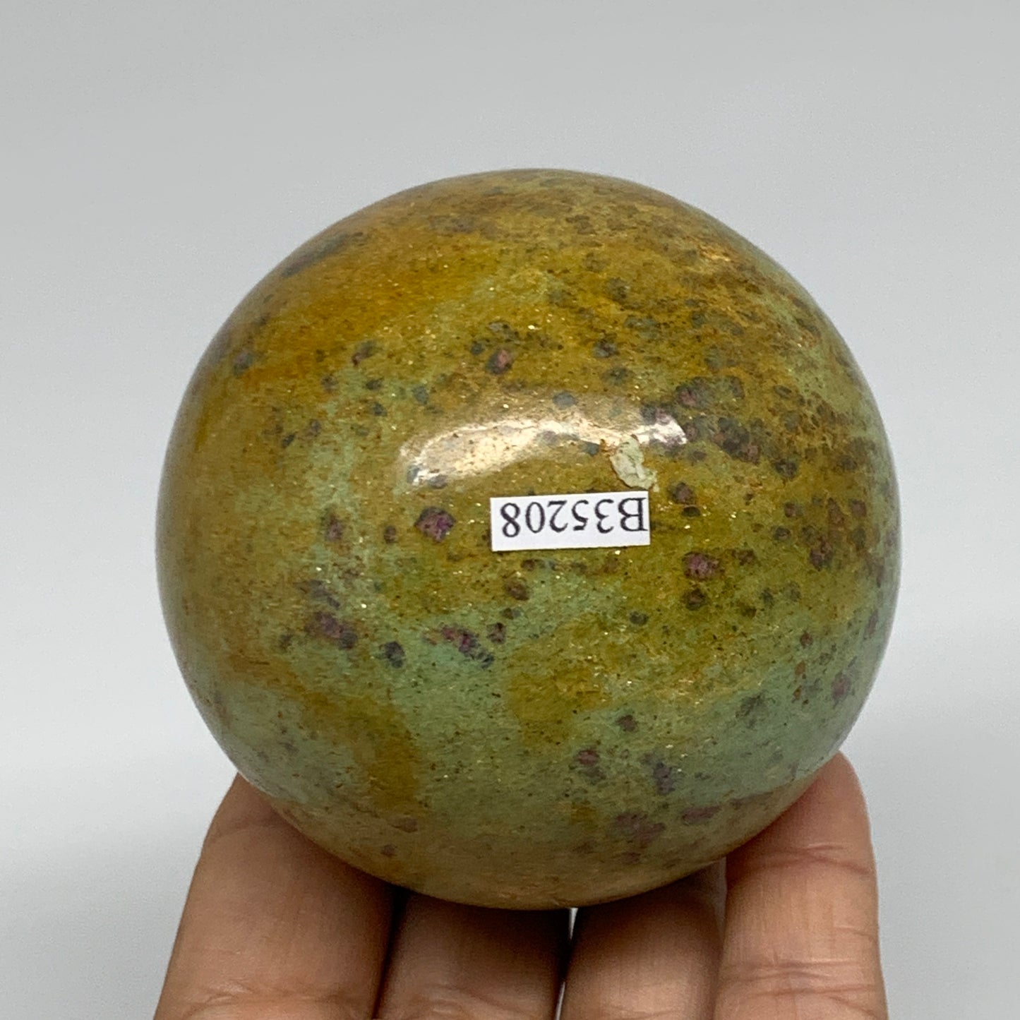 1.26 lbs, 2.8"(72mm), Zoisite with Ruby Sphere Sphere Ball Crystal, B25208