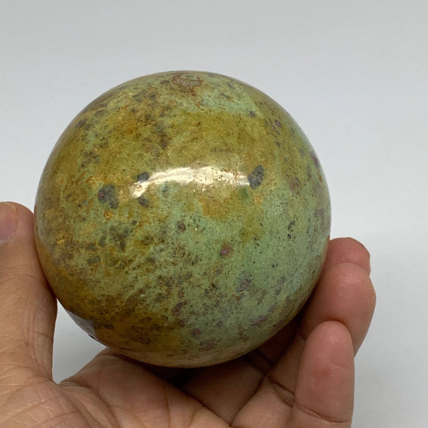 1.26 lbs, 2.8"(72mm), Zoisite with Ruby Sphere Sphere Ball Crystal, B25208