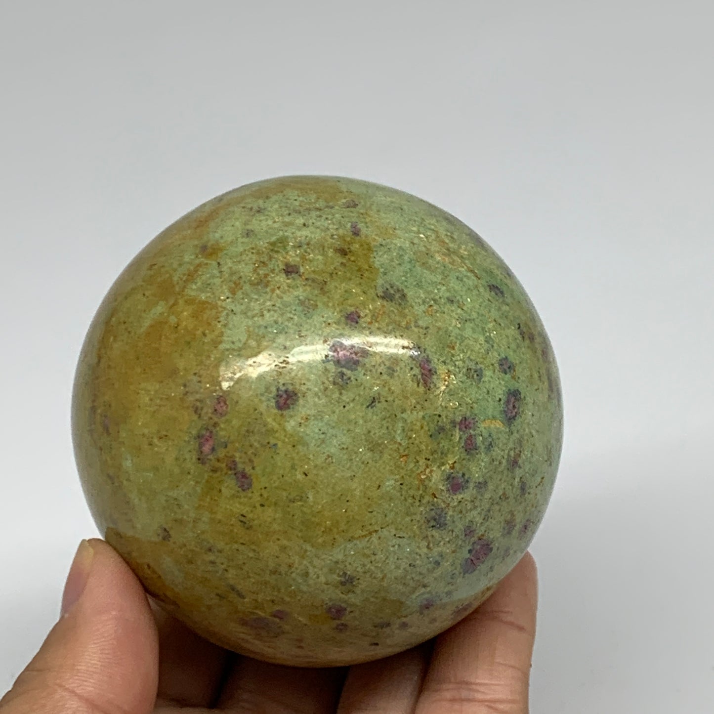 1.26 lbs, 2.8"(72mm), Zoisite with Ruby Sphere Sphere Ball Crystal, B25208