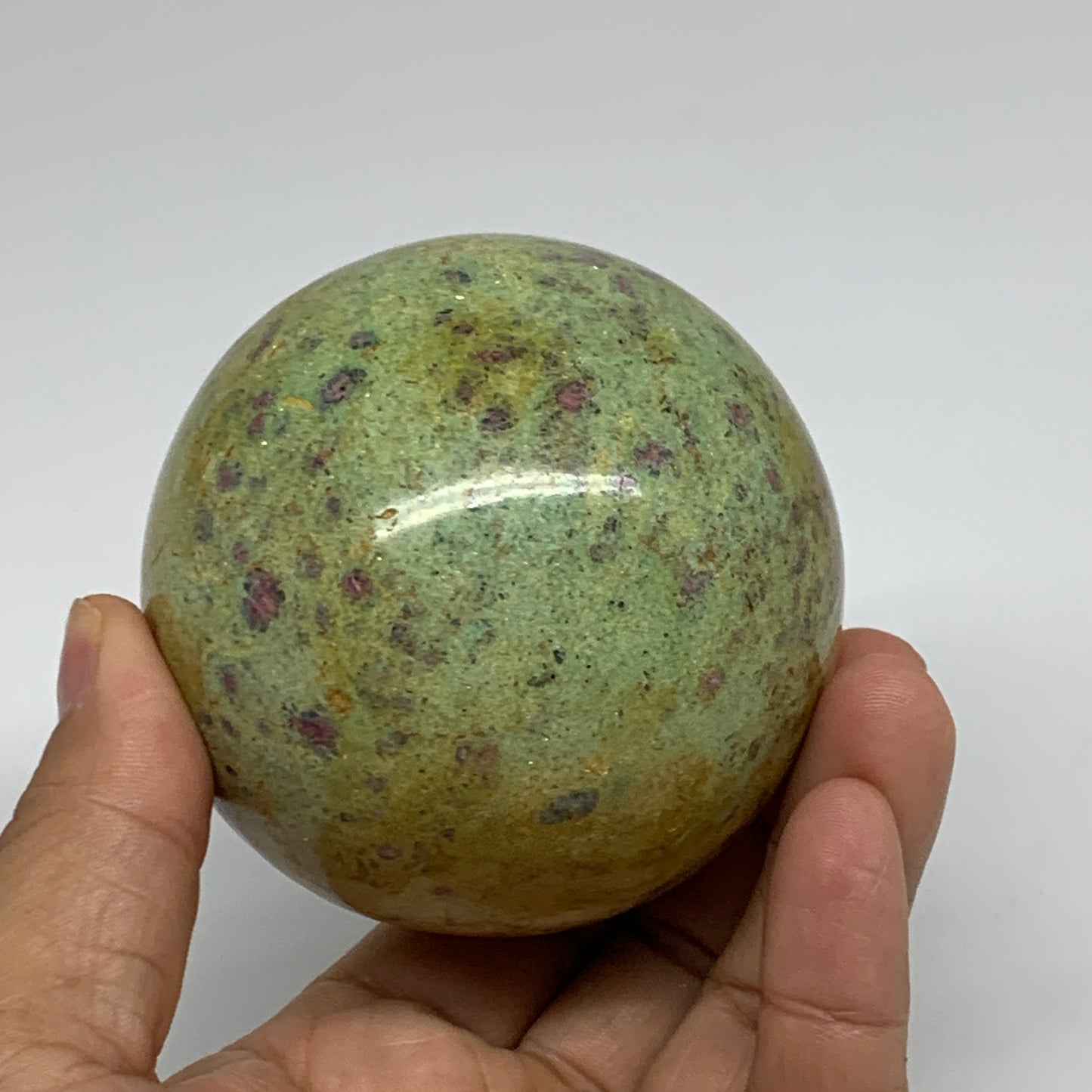 1.26 lbs, 2.8"(72mm), Zoisite with Ruby Sphere Sphere Ball Crystal, B25208