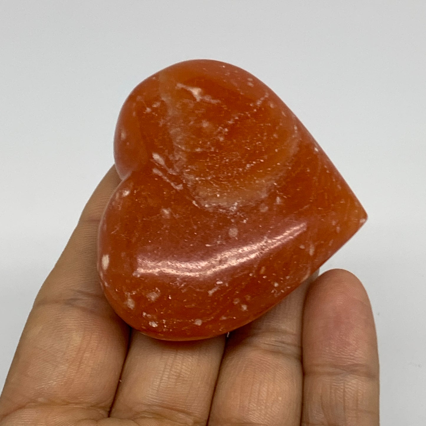 76.8g, 2"x2.4"x0.8" Orange Calcite Heart Gemstones from Madagascar, B33793