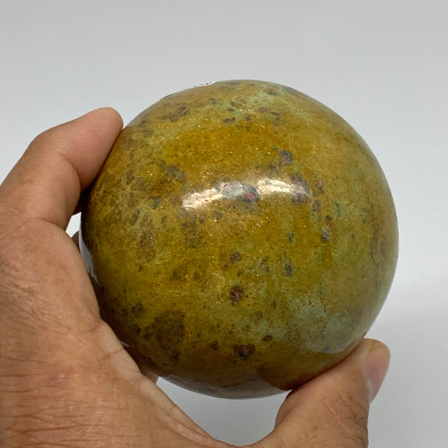 1.26 lbs, 2.8"(72mm), Zoisite with Ruby Sphere Sphere Ball Crystal, B25208