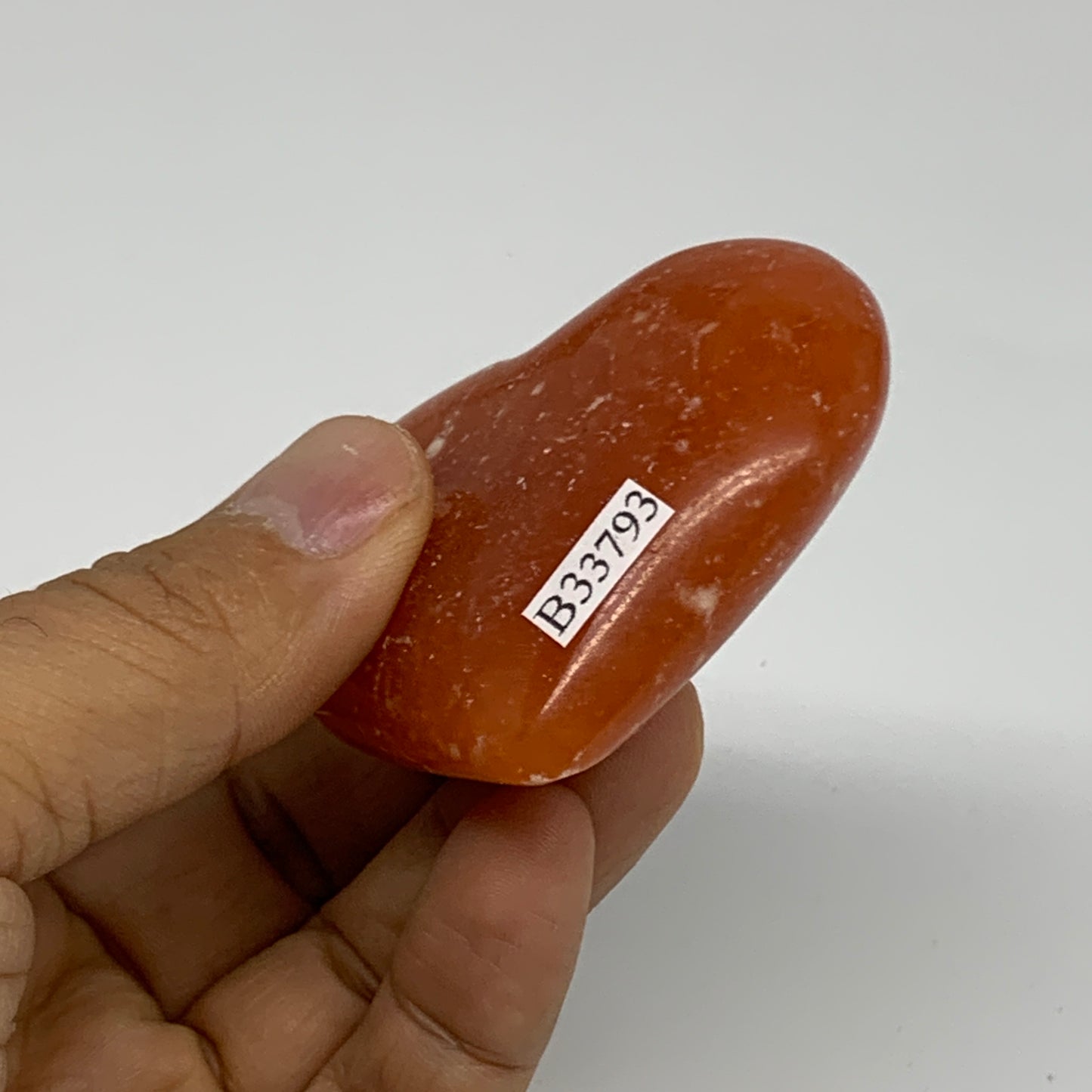 76.8g, 2"x2.4"x0.8" Orange Calcite Heart Gemstones from Madagascar, B33793