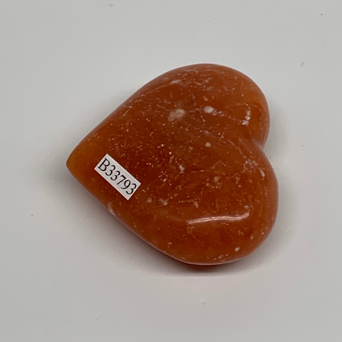 76.8g, 2"x2.4"x0.8" Orange Calcite Heart Gemstones from Madagascar, B33793