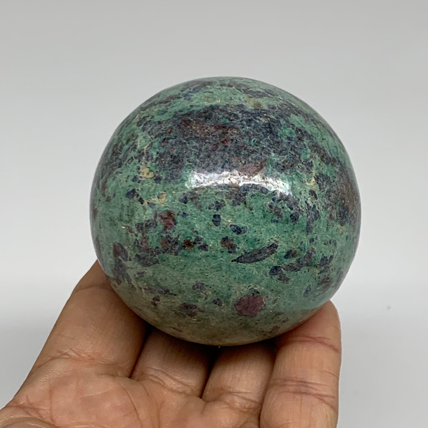 0.88 lbs, 2.4"(61mm), Zoisite with Ruby Sphere Sphere Ball Crystal, B25211