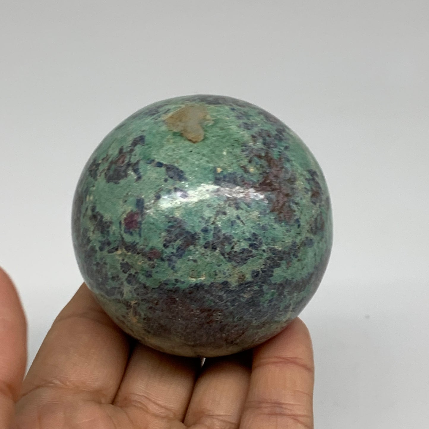 0.88 lbs, 2.4"(61mm), Zoisite with Ruby Sphere Sphere Ball Crystal, B25211