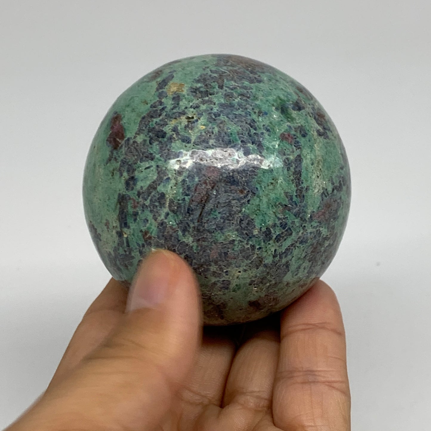 0.88 lbs, 2.4"(61mm), Zoisite with Ruby Sphere Sphere Ball Crystal, B25211