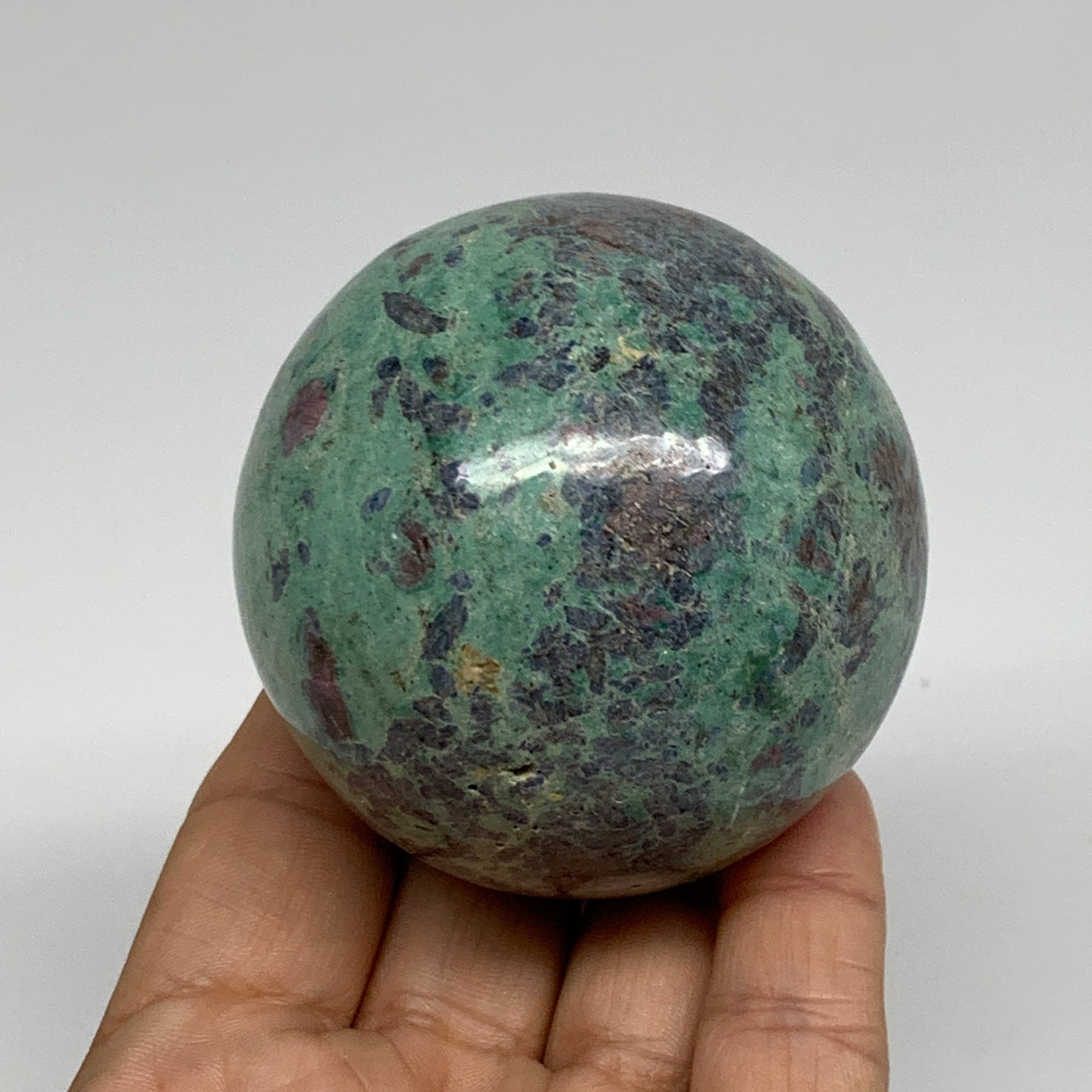 0.88 lbs, 2.4"(61mm), Zoisite with Ruby Sphere Sphere Ball Crystal, B25211