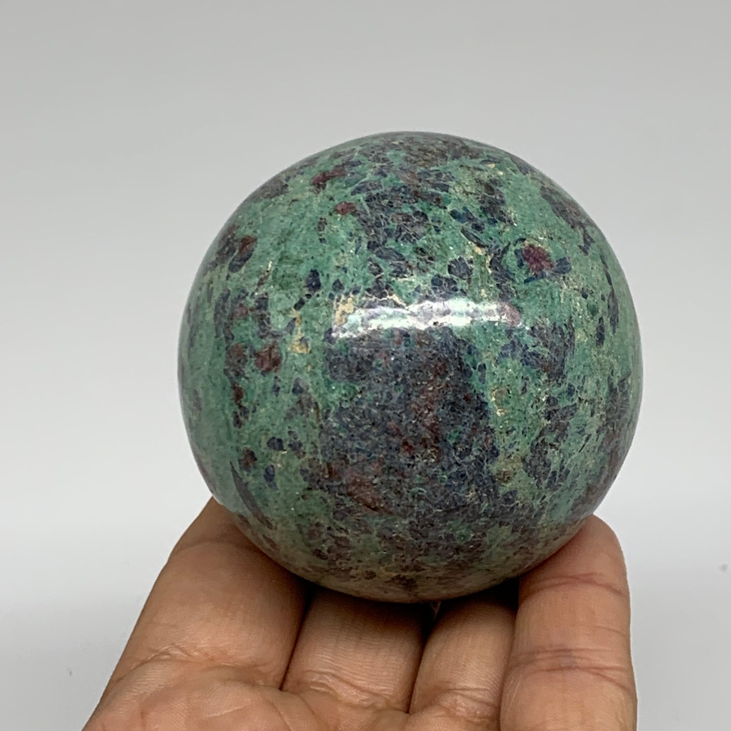 0.88 lbs, 2.4"(61mm), Zoisite with Ruby Sphere Sphere Ball Crystal, B25211