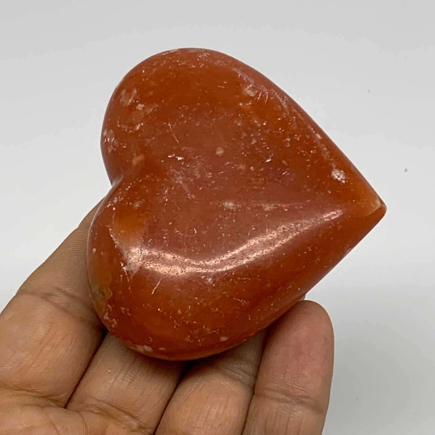 115.8g,2.3"x2.6"x1" Orange Calcite Heart Gemstones from Madagascar, B33796