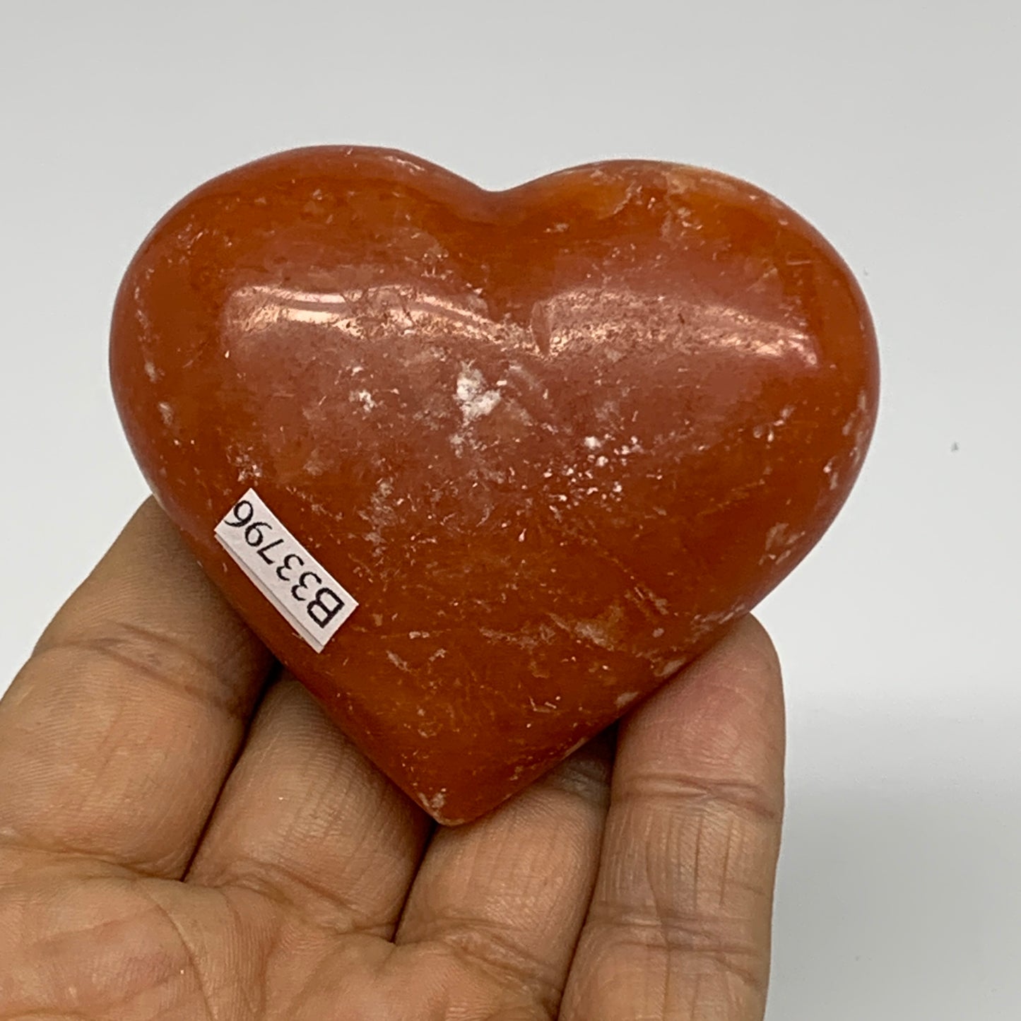 115.8g,2.3"x2.6"x1" Orange Calcite Heart Gemstones from Madagascar, B33796