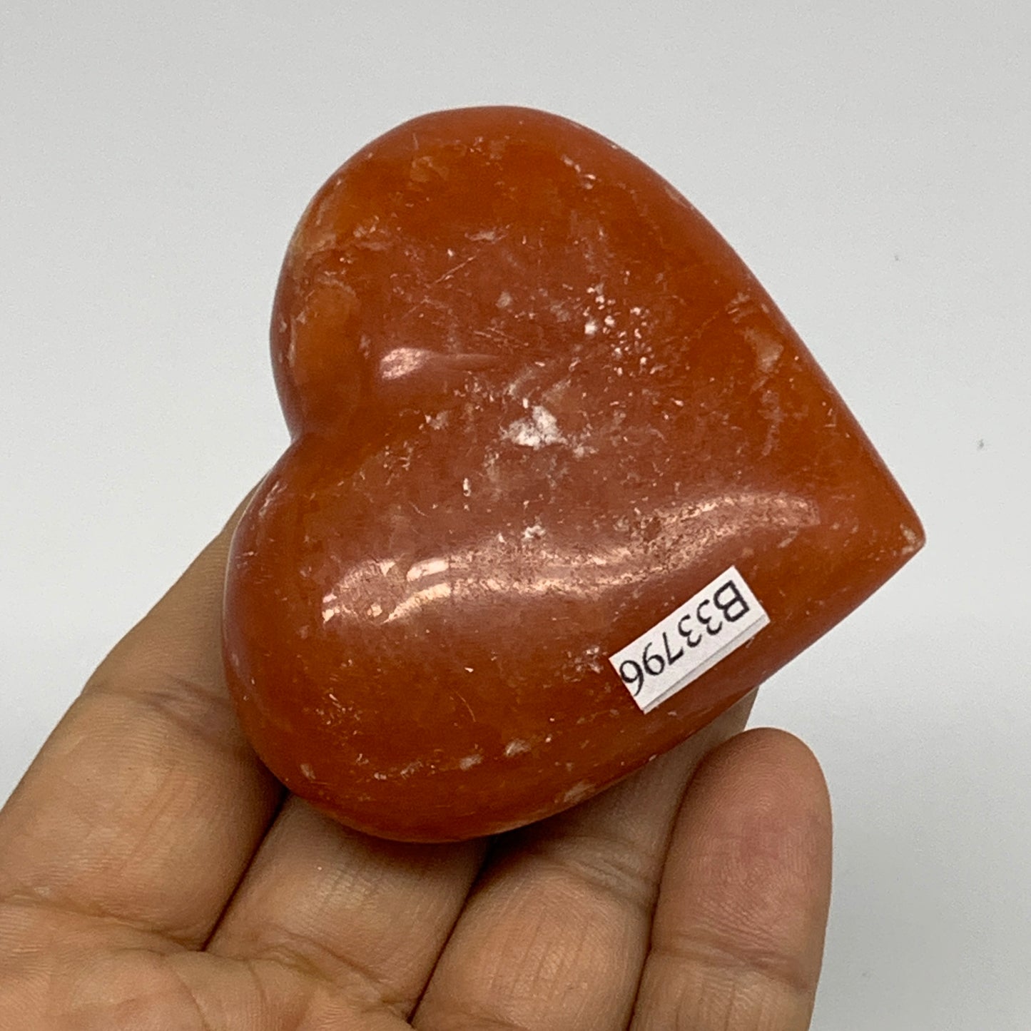 115.8g,2.3"x2.6"x1" Orange Calcite Heart Gemstones from Madagascar, B33796