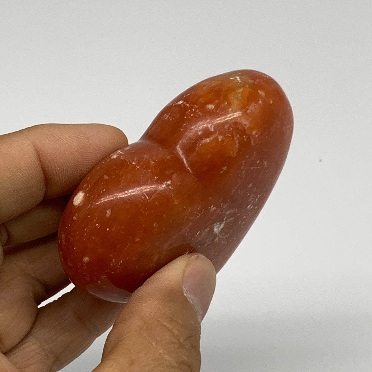 115.8g,2.3"x2.6"x1" Orange Calcite Heart Gemstones from Madagascar, B33796