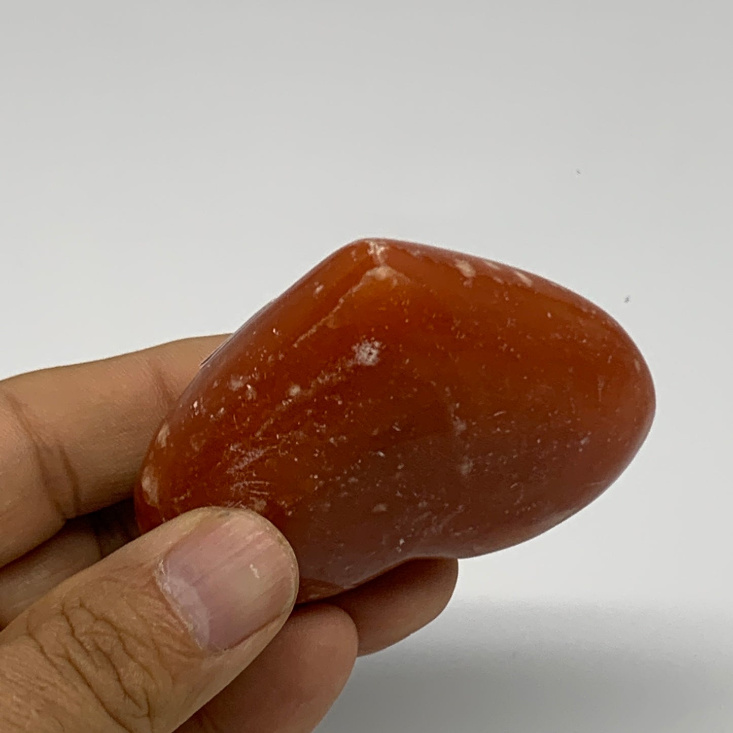 115.8g,2.3"x2.6"x1" Orange Calcite Heart Gemstones from Madagascar, B33796