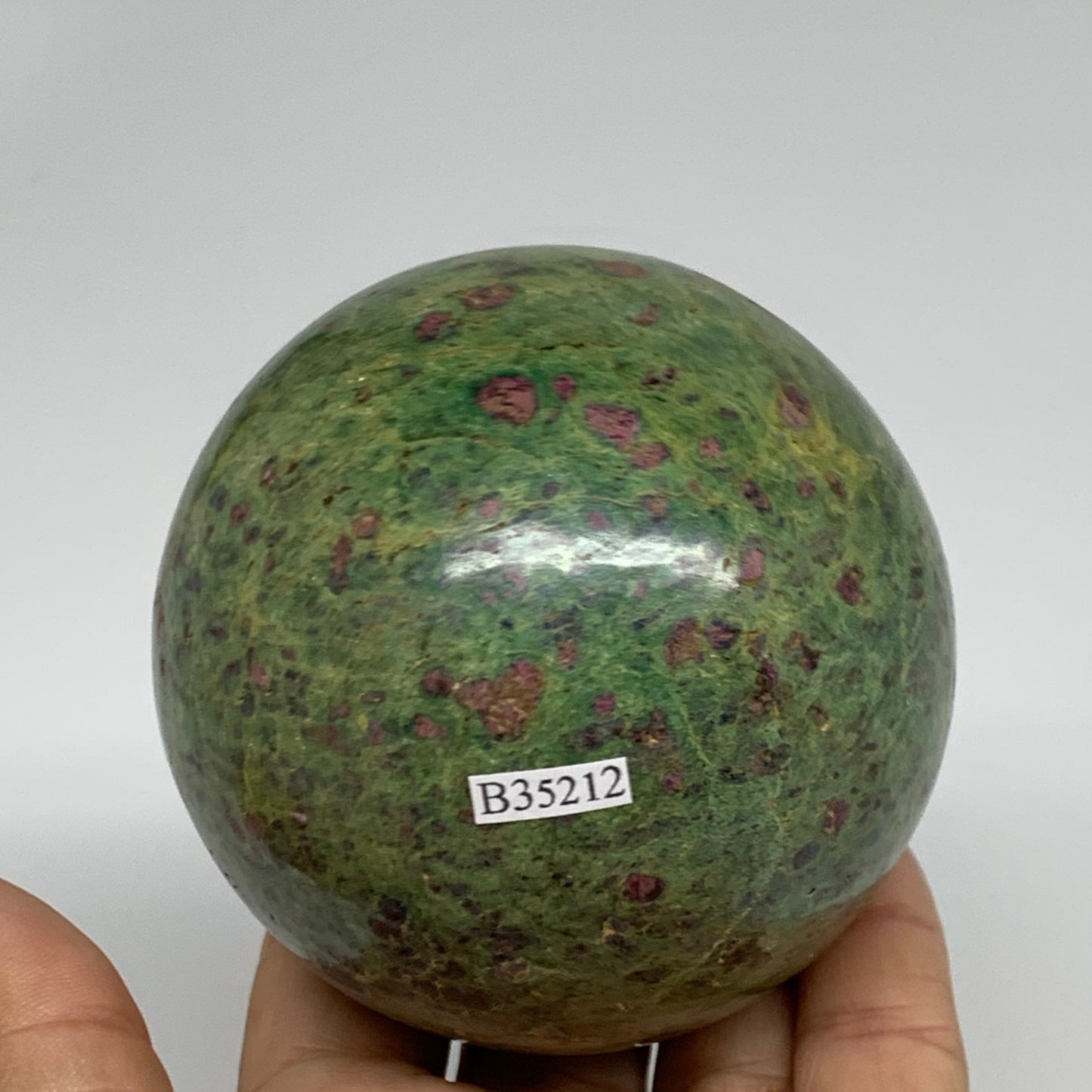 1.6 lbs, 3.1"(79mm), Zoisite with Ruby Sphere Sphere Ball Crystal, B25212