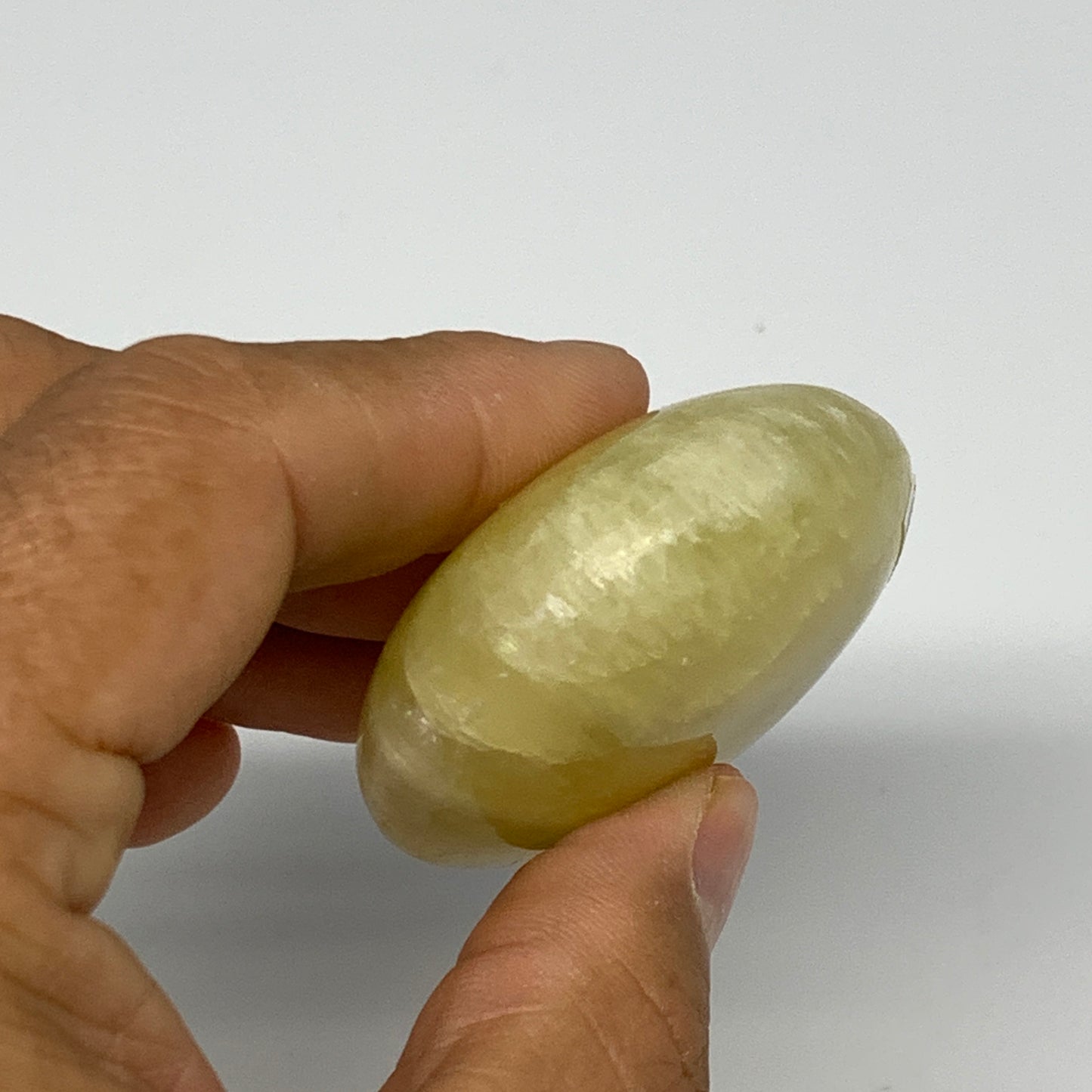 116.8g, 2.8"x1.9"x0.9", Lemon Calcite Palm-Stone Crystal Polished @Pakistan,B259