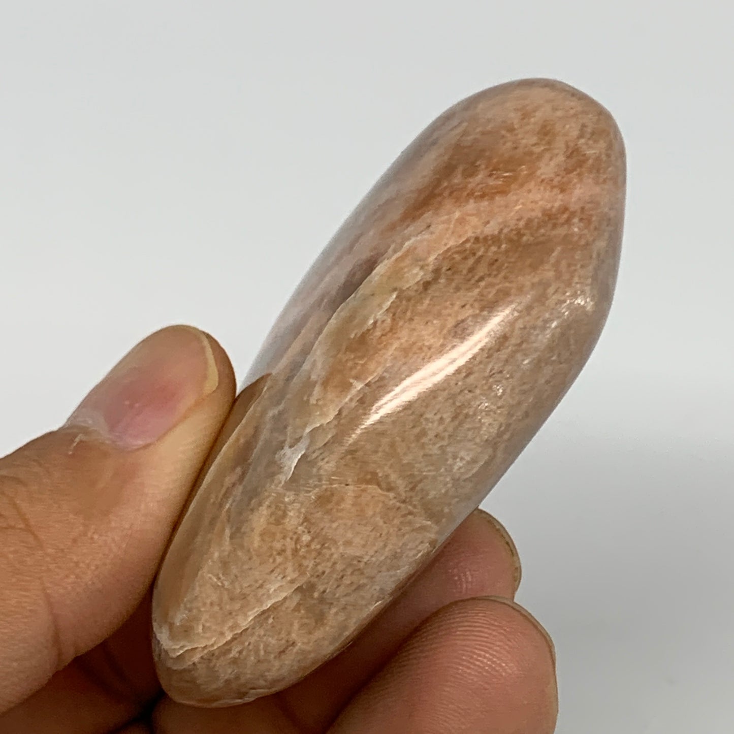 80.8g,2.4"x1.8"x0.9", Peach Moonstone Palm-Stone Polished Reiki Crystal, B15462