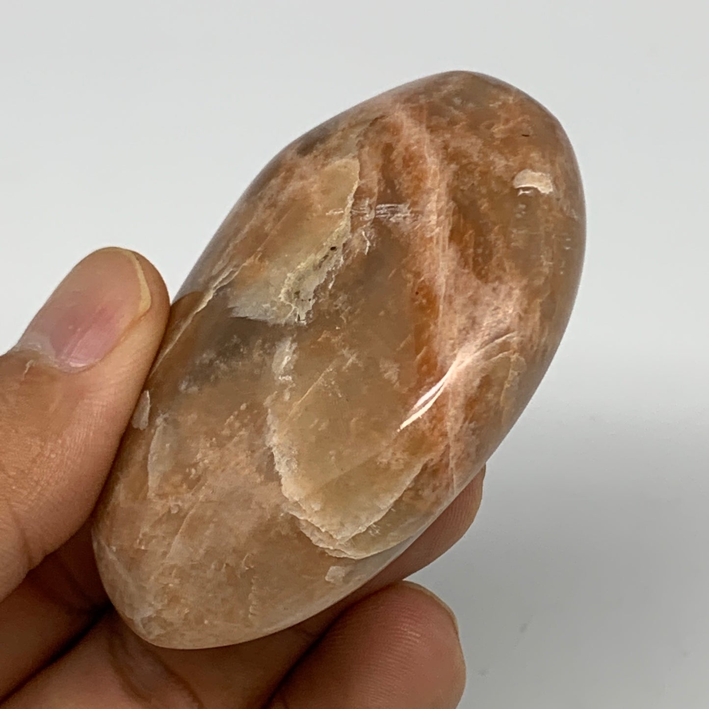 80.8g,2.4"x1.8"x0.9", Peach Moonstone Palm-Stone Polished Reiki Crystal, B15462