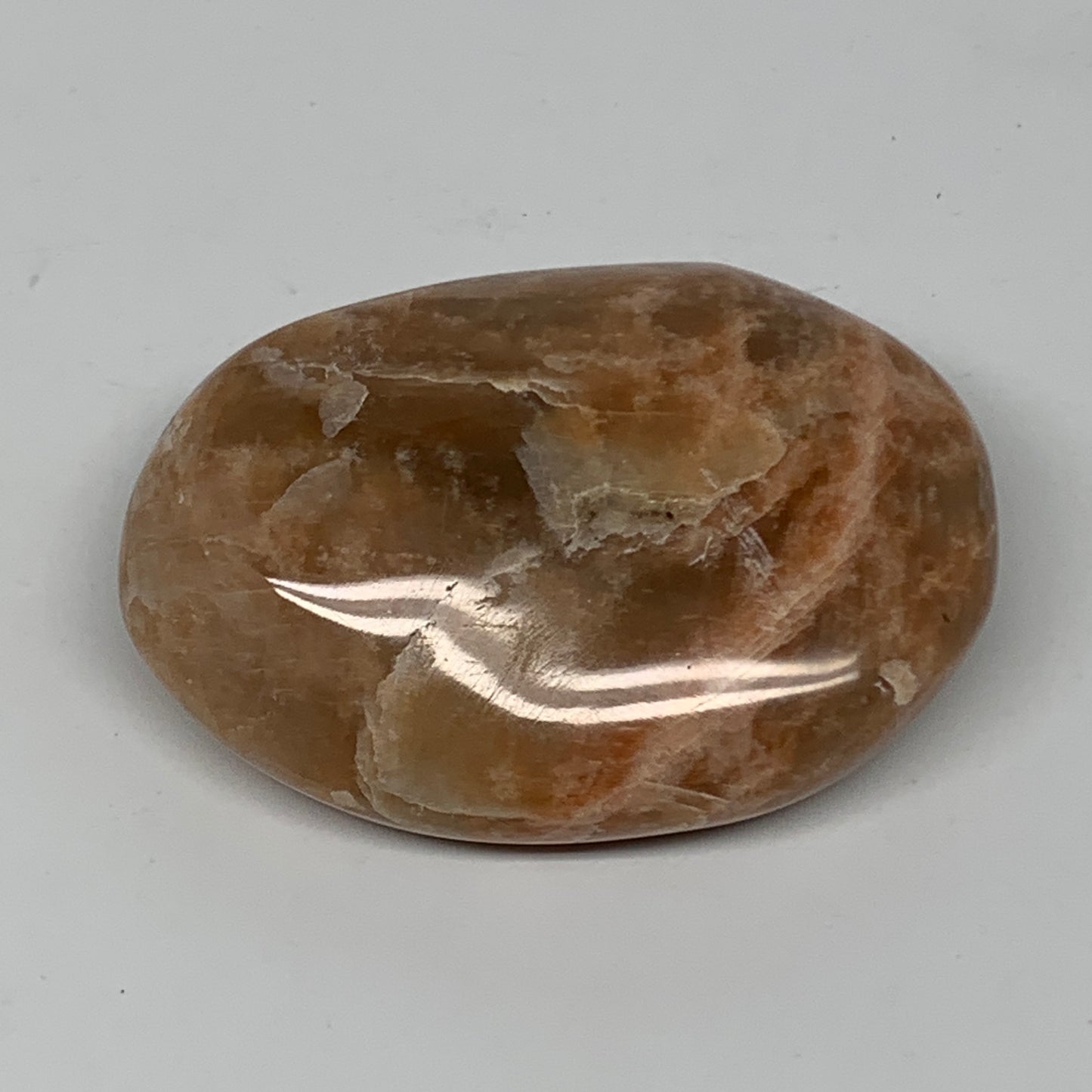 80.8g,2.4"x1.8"x0.9", Peach Moonstone Palm-Stone Polished Reiki Crystal, B15462