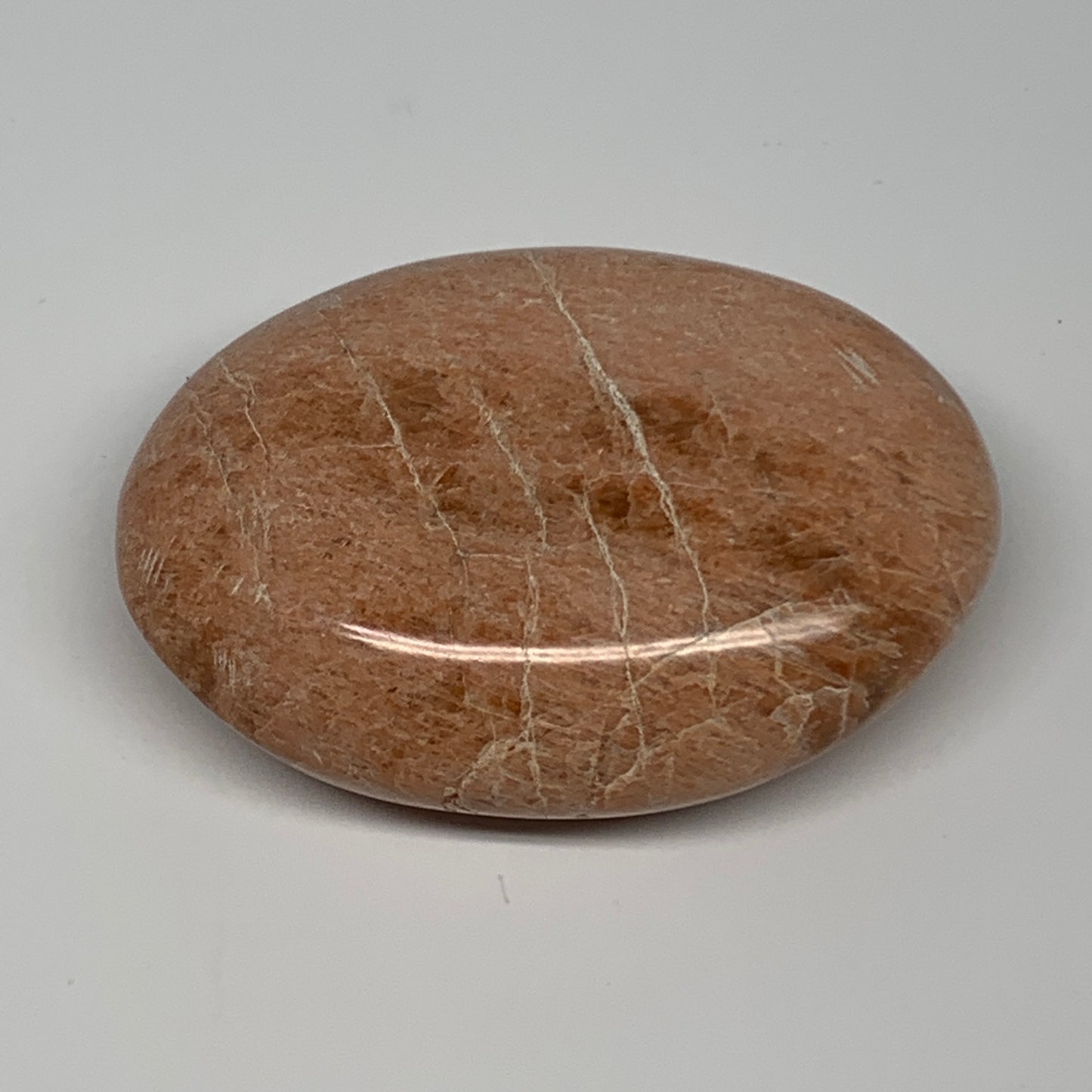 106.1g,2.6"x1.9"x0.9", Peach Moonstone Palm-Stone Polished Reiki Crystal, B15481