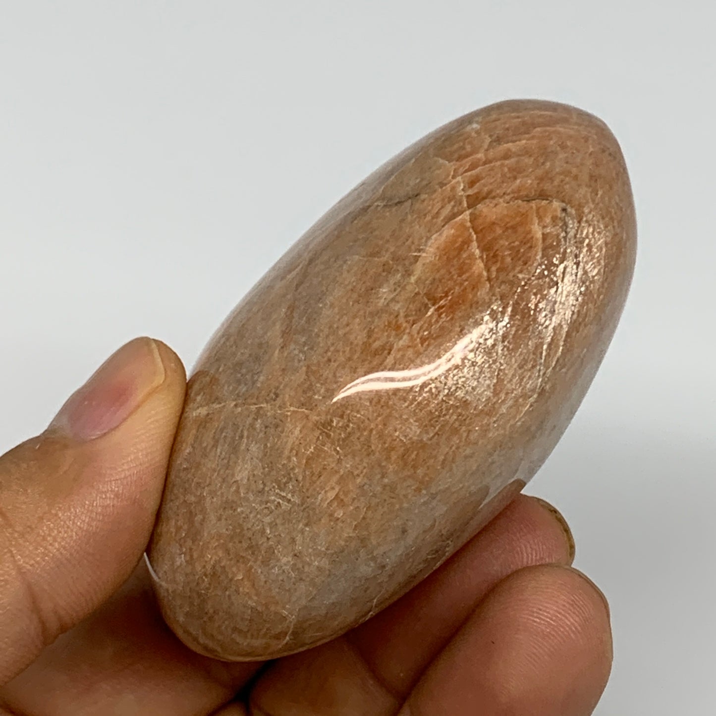 152g,2.6"x2"x1.3", Peach Moonstone Palm-Stone Polished Reiki Crystal, B15510