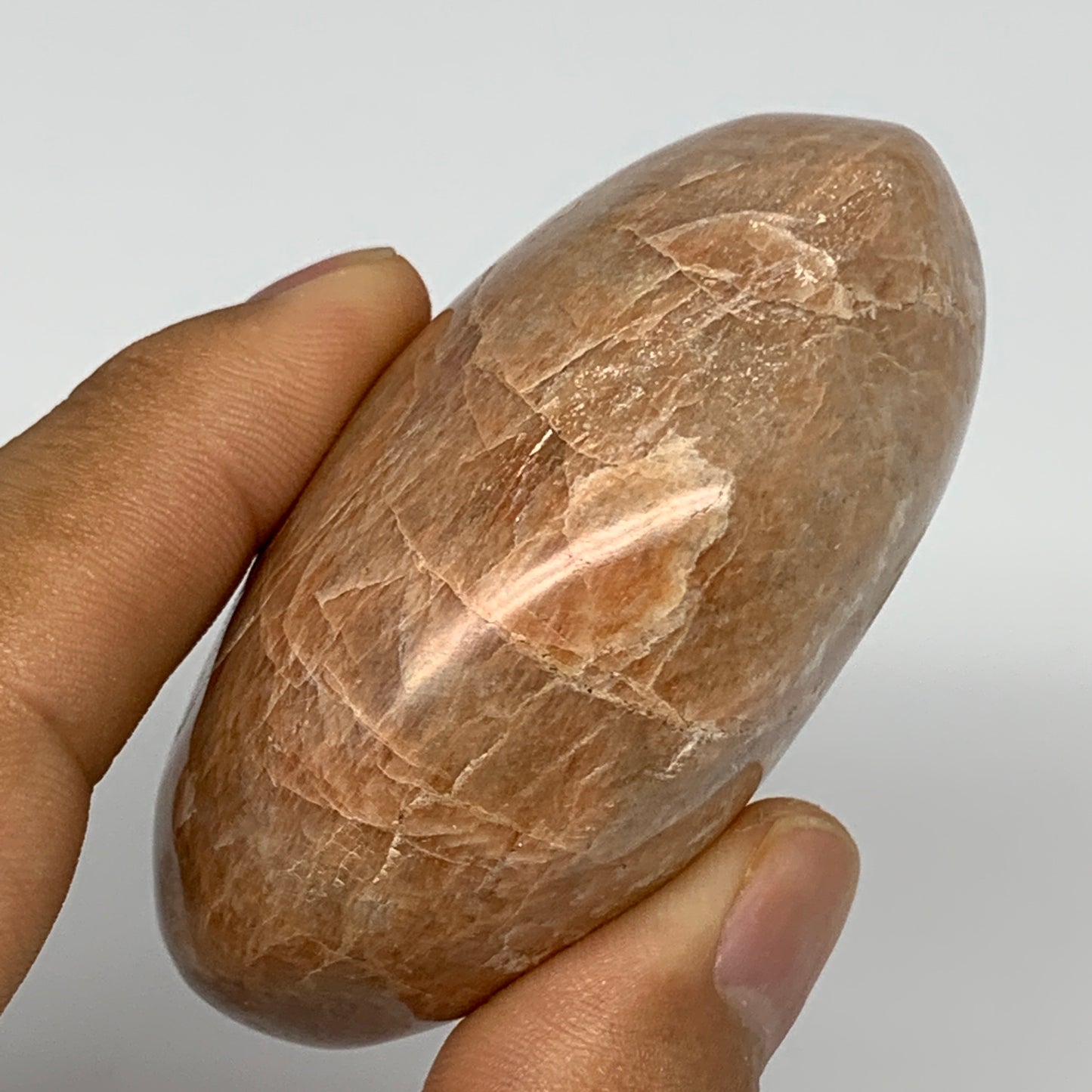 152g,2.6"x2"x1.3", Peach Moonstone Palm-Stone Polished Reiki Crystal, B15510