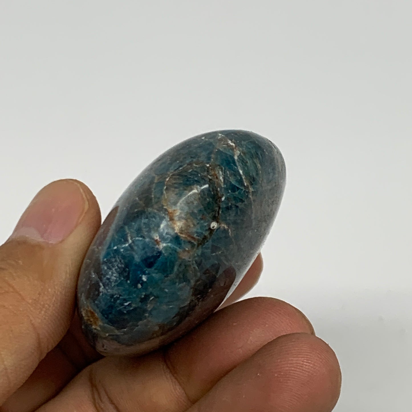 107.1g, 2.4"x1.7"x1", Blue Apatite Palm-Stone Polished from Madagascar, B16402