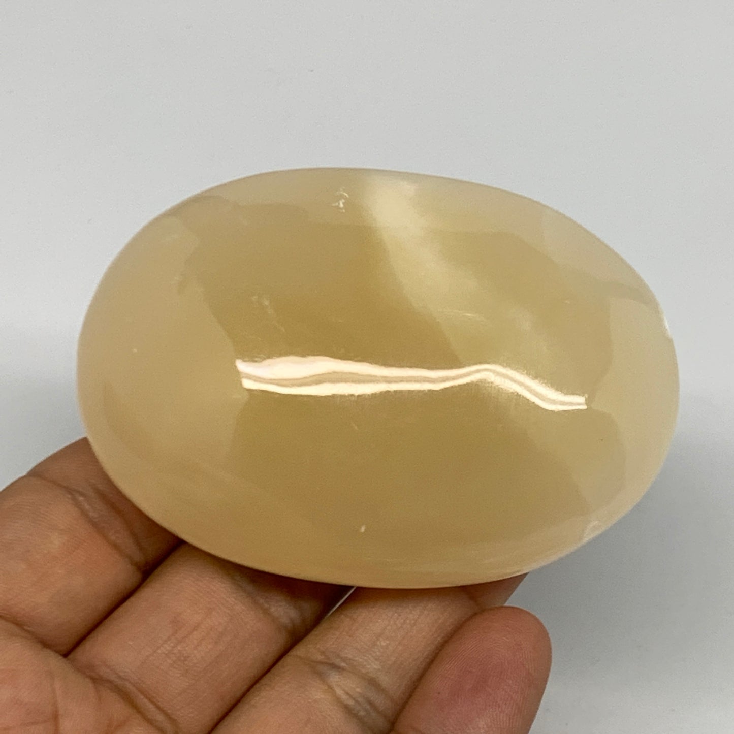 145.9g,2.9"x2"x1.1",Honey Calcite Palm-Stone Crystal Polished @Pakistan,B23088