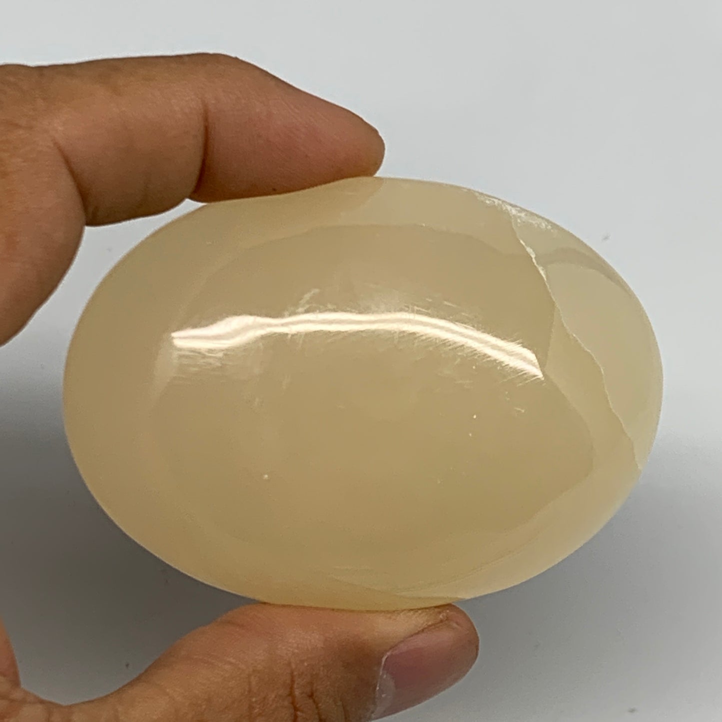 115.6g,2.6"x1.9"x1",Honey Calcite Palm-Stone Crystal Polished @Pakistan,B23095