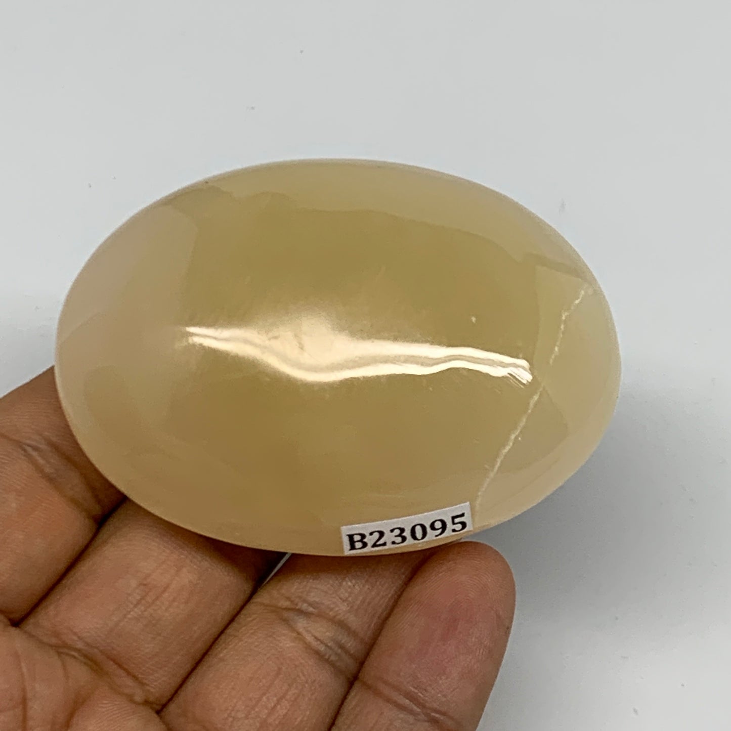 115.6g,2.6"x1.9"x1",Honey Calcite Palm-Stone Crystal Polished @Pakistan,B23095