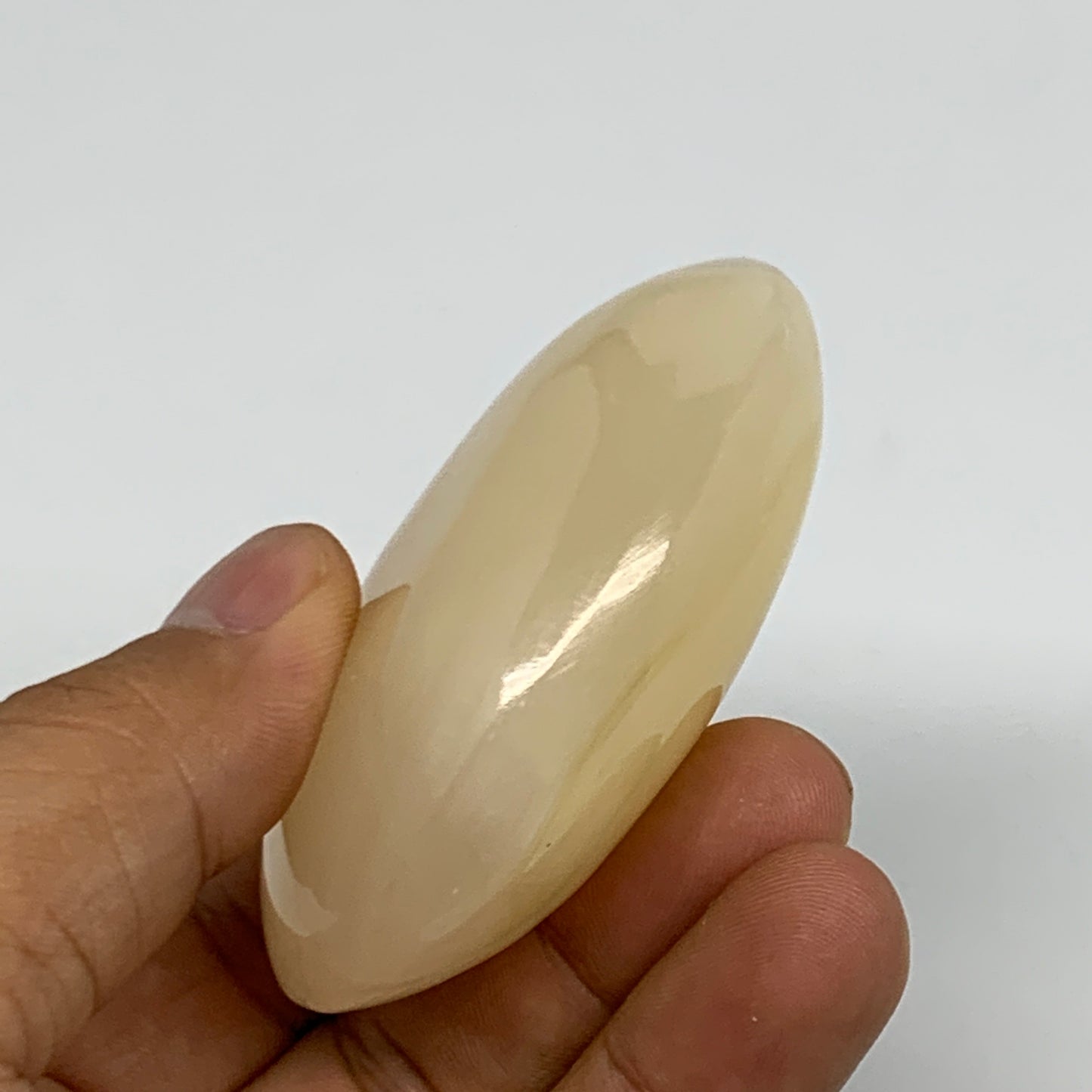 115.6g,2.6"x1.9"x1",Honey Calcite Palm-Stone Crystal Polished @Pakistan,B23095