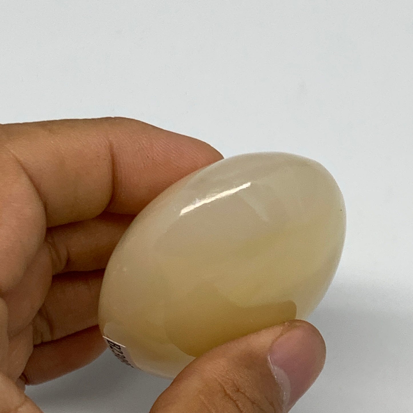 115.6g,2.6"x1.9"x1",Honey Calcite Palm-Stone Crystal Polished @Pakistan,B23095