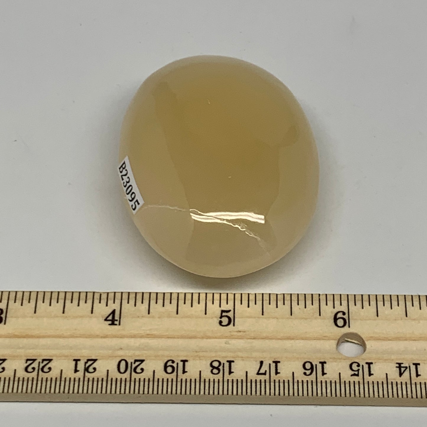 115.6g,2.6"x1.9"x1",Honey Calcite Palm-Stone Crystal Polished @Pakistan,B23095