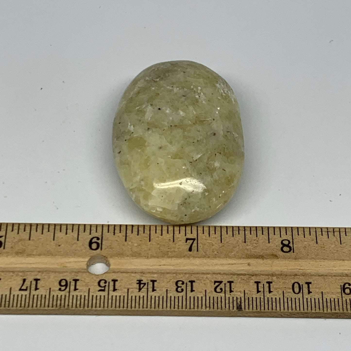 64.6g, 2.1"x1.4"x0.8", Natural Yellow Calcite Palm-Stone Crystal Polished Reiki,