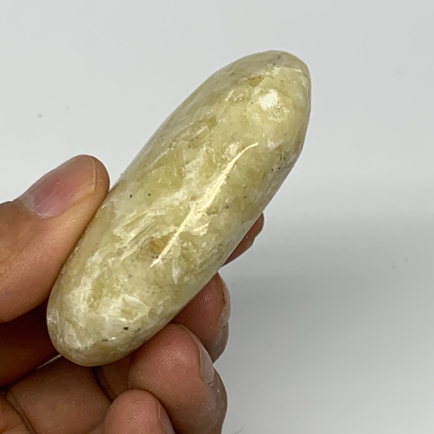 78.3g, 2.3"x1.6"x0.8", Natural Yellow Calcite Palm-Stone Crystal Polished Reiki,