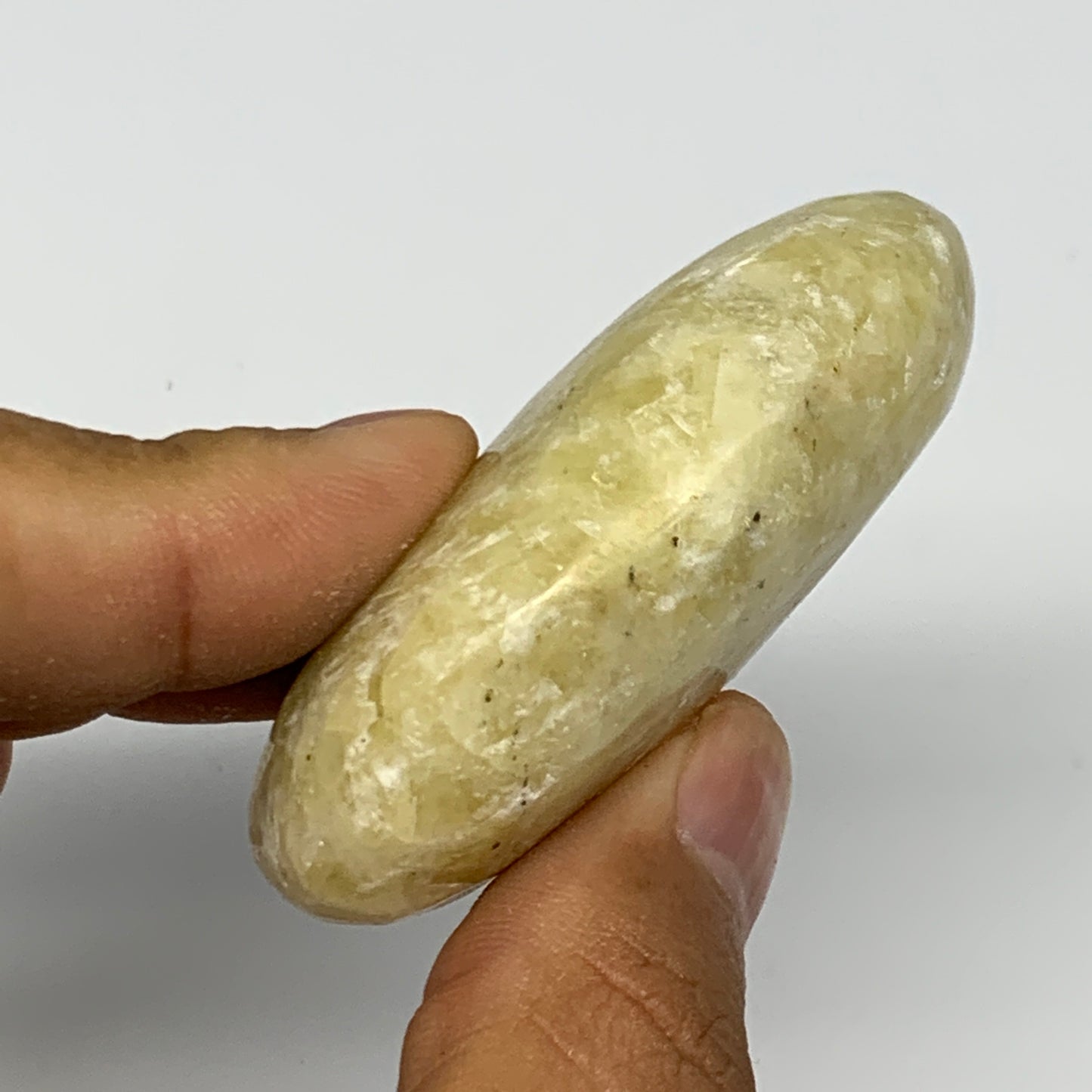 78.3g, 2.3"x1.6"x0.8", Natural Yellow Calcite Palm-Stone Crystal Polished Reiki,