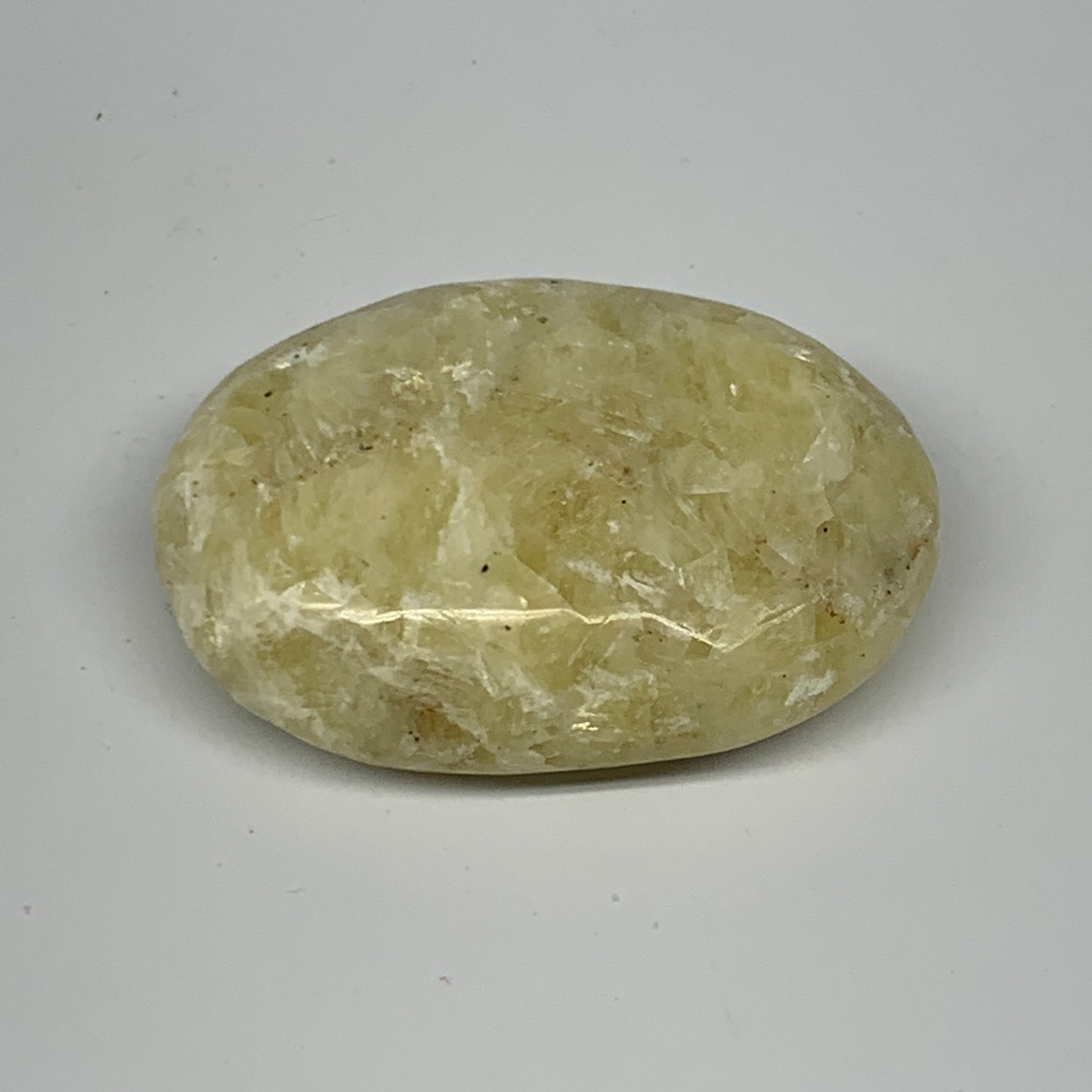 78.3g, 2.3"x1.6"x0.8", Natural Yellow Calcite Palm-Stone Crystal Polished Reiki,