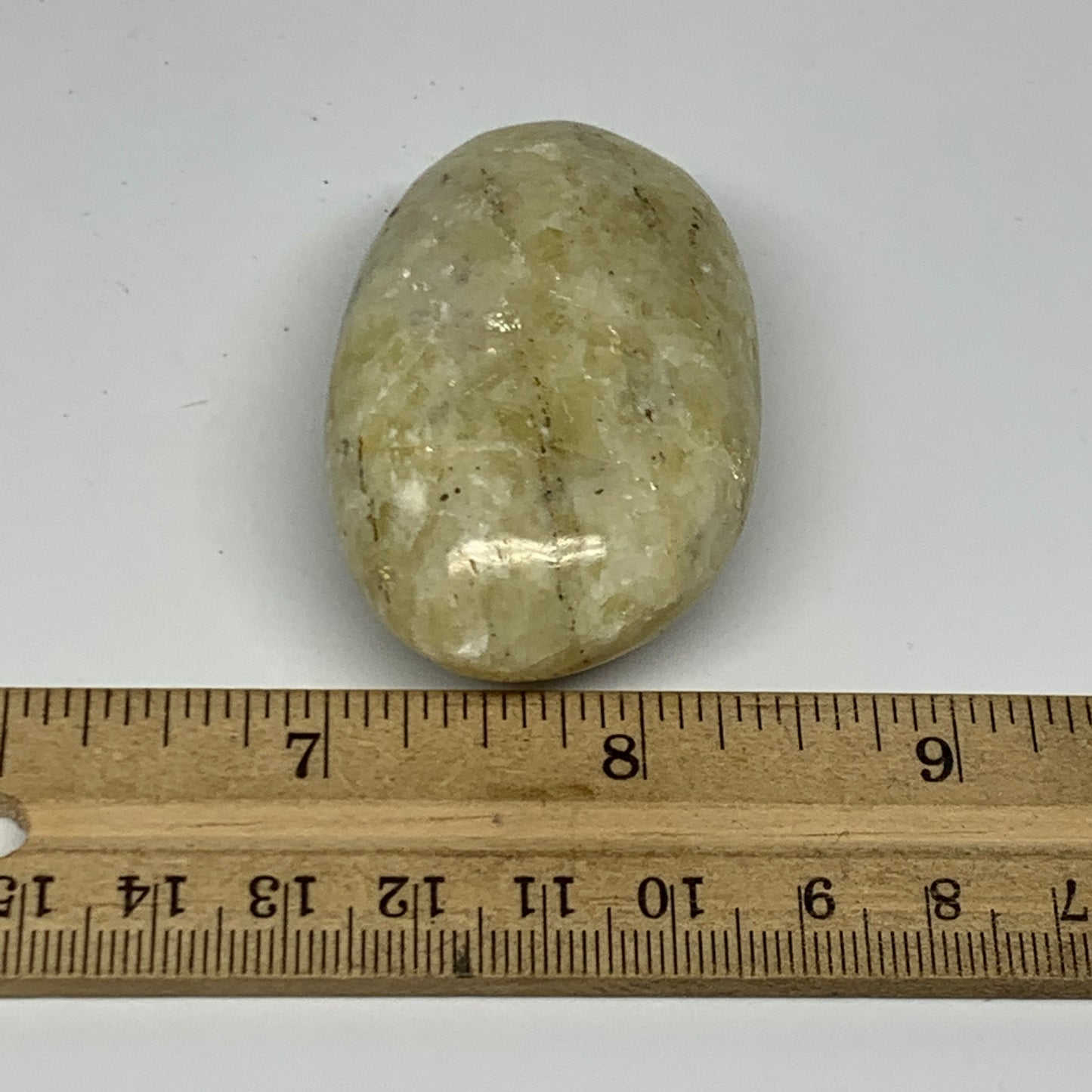 73.8g, 2.2"x1.4"x0.9", Natural Yellow Calcite Palm-Stone Crystal Polished Reiki,